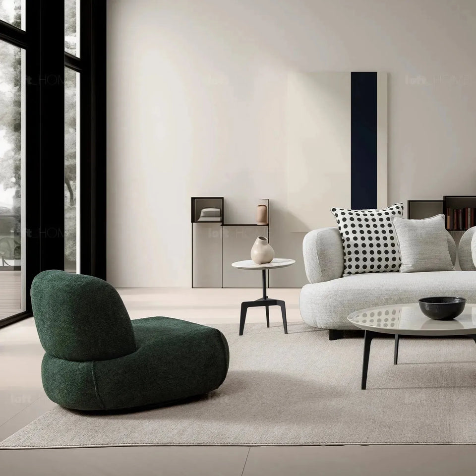 Cream mixed weave fabric revolving 1 seater sofa moss in close up details.