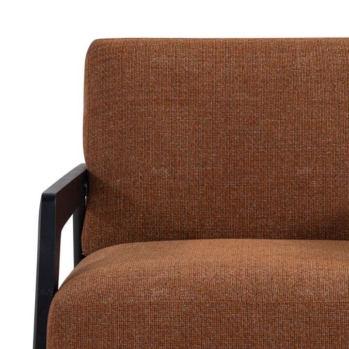 Minimalist fabric 1 seater sofa sempre with context.