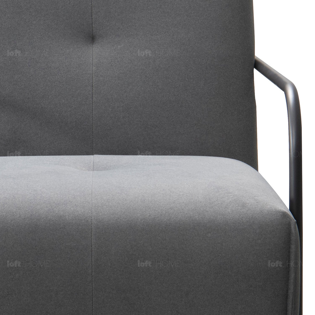 Minimalist fabric 1 seater sofa talc metal in details.