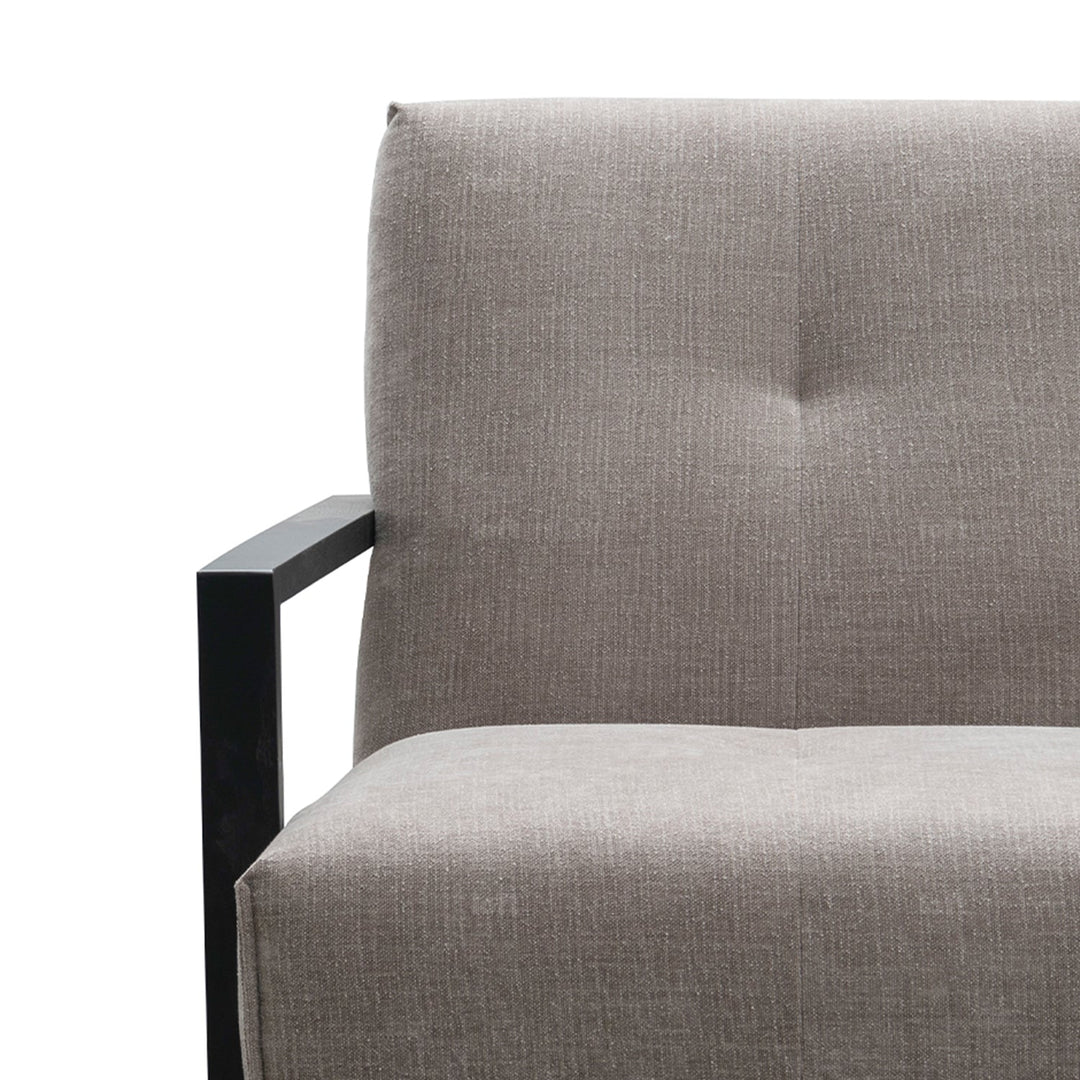 Minimalist fabric 1 seater sofa talc wood with context.