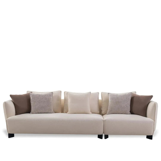 Modern fabric 4 seater sofa angler in white background.