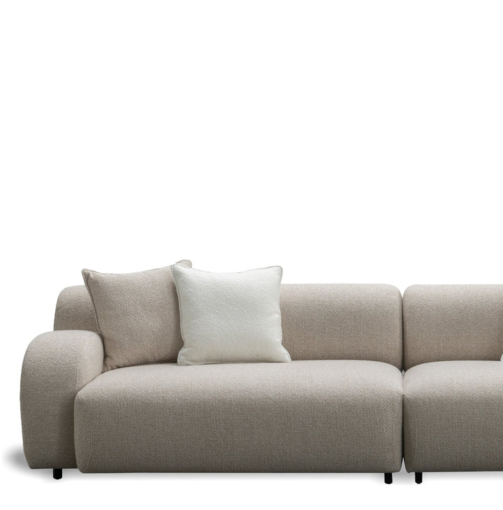 Minimalist fabric 4 seater sofa ench in real life style.