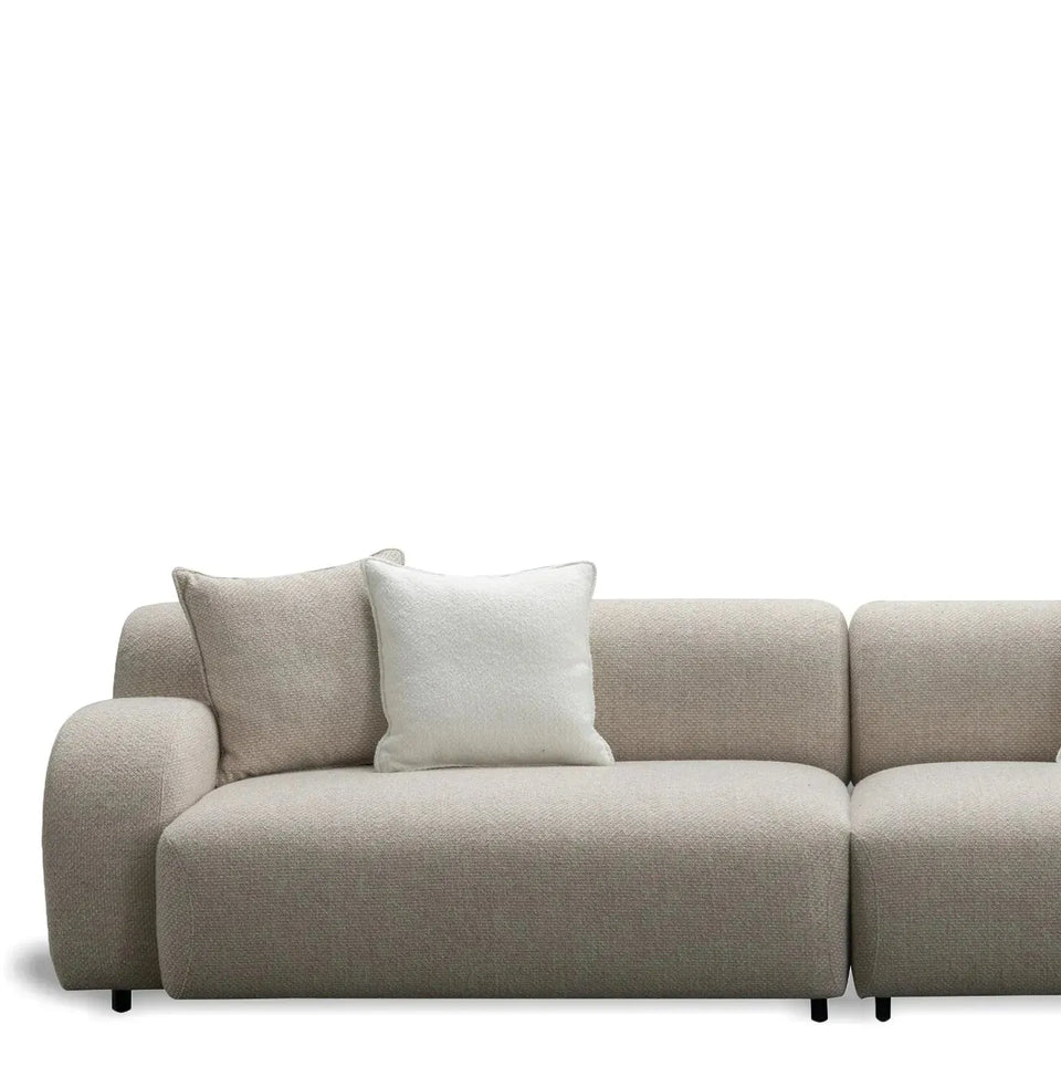 Modern mixed weave fabric 4 seater sofa ench in real life style.