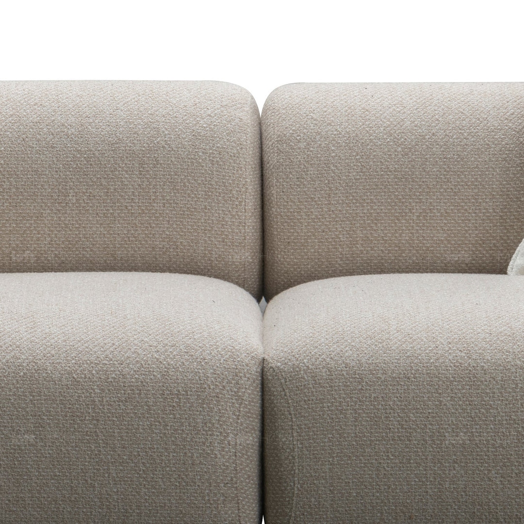 Minimalist fabric 4 seater sofa ench in details.