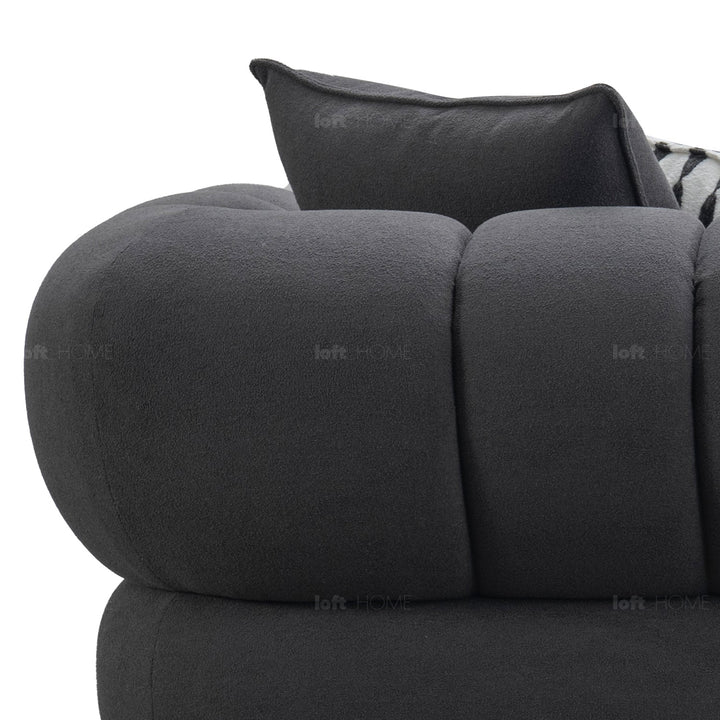 Minimalist sherpa fabric 4 seater sofa lace in details.