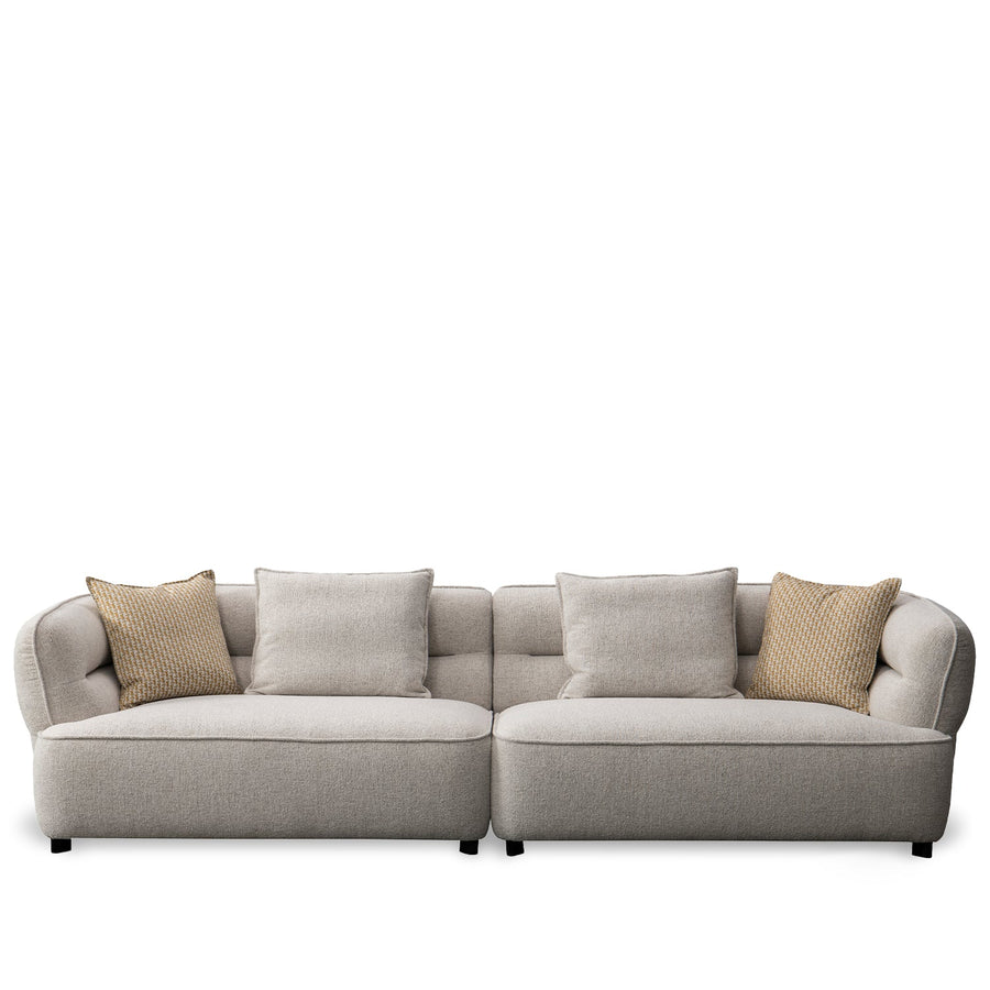 Minimalist fabric 4 seater sofa manor in white background.