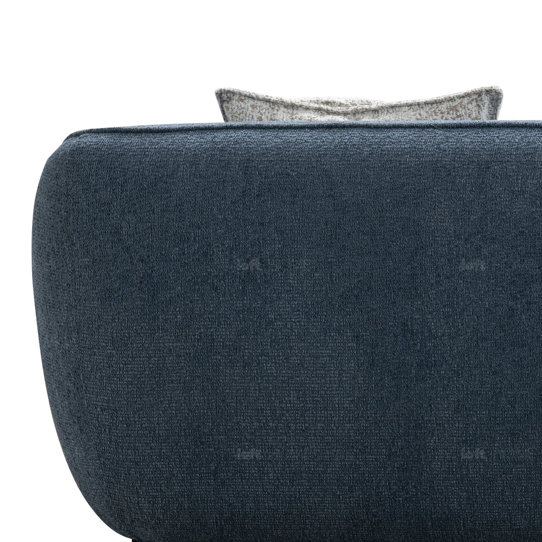 Minimalist fabric 4 seater sofa nep with context.