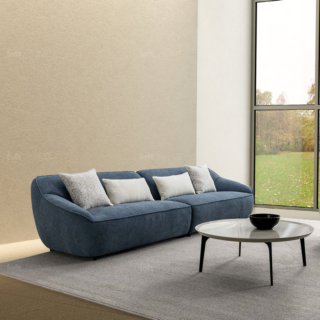 Minimalist fabric 4 seater sofa nep in close up details.