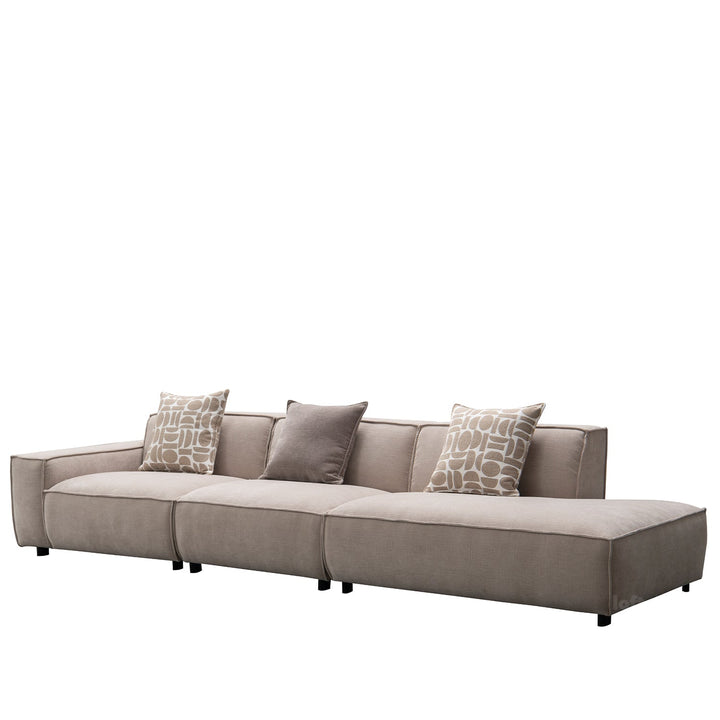 Minimalist fabric 4.5 seater sofa glade material variants.