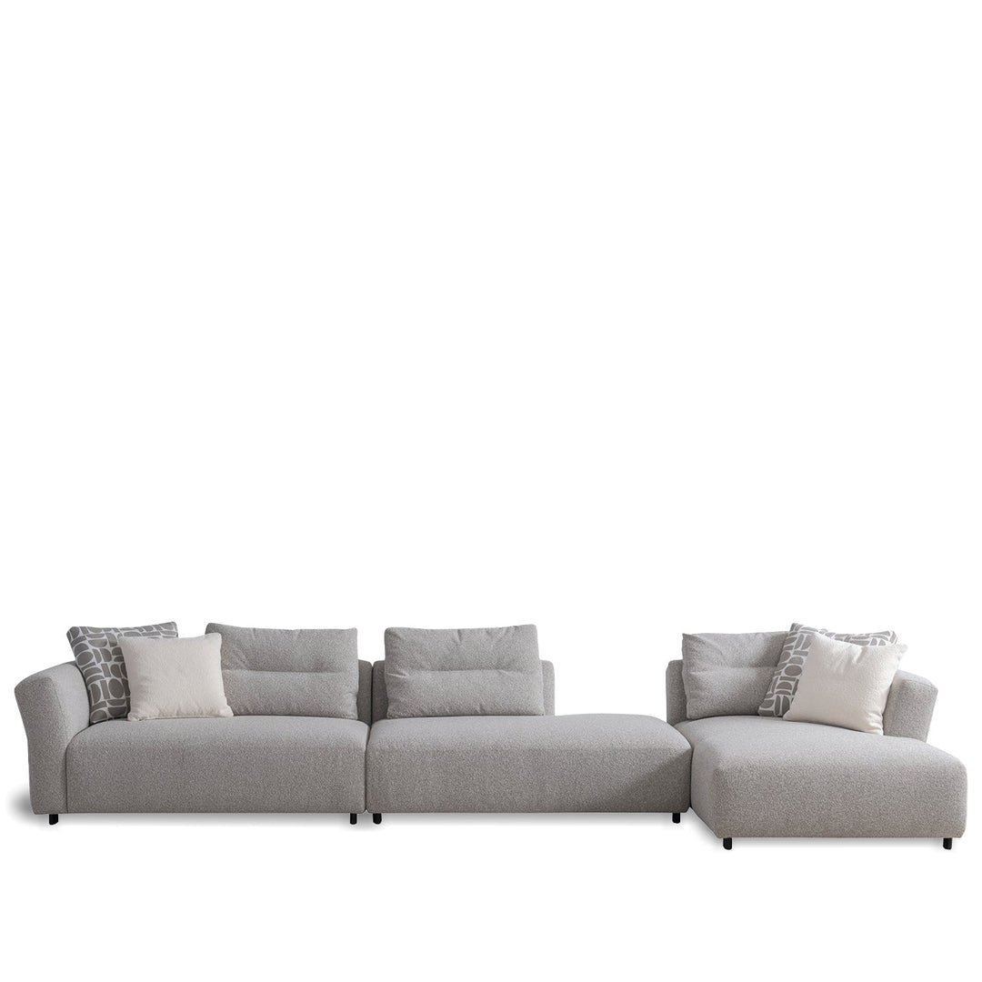 Minimalist mixed weave fabric l shape sectional sofa escape 5+l in white background.