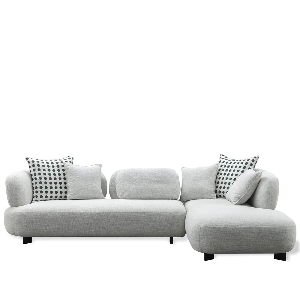 Minimalist mixed weave fabric l shape sectional sofa monti 4+l in white background.