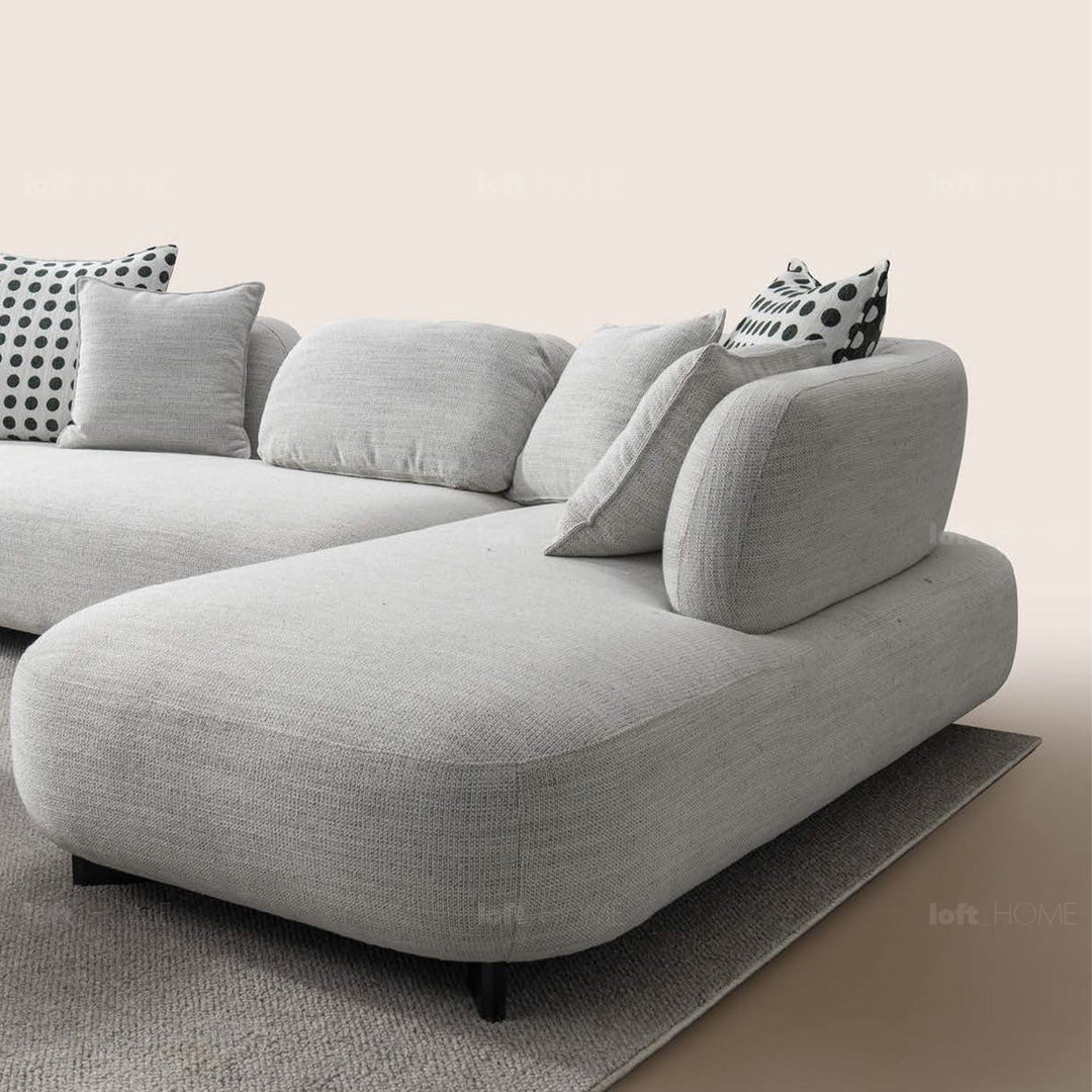Minimalist fabric l shape sectional sofa monti 4+l material variants.