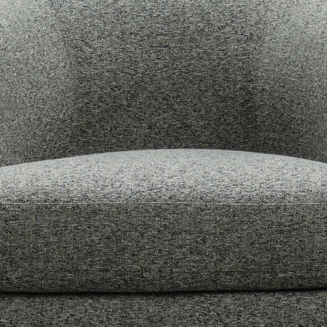 Minimalist fabric revolving 1 seater sofa goyle in panoramic view.