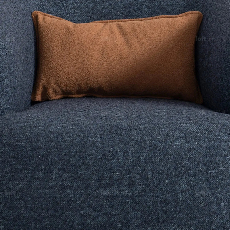 Cream boucle fabric revolving 1 seater sofa vance in close up details.