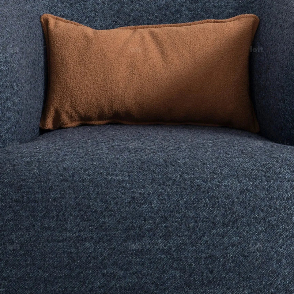 Cream boucle fabric revolving 1 seater sofa vance in close up details.