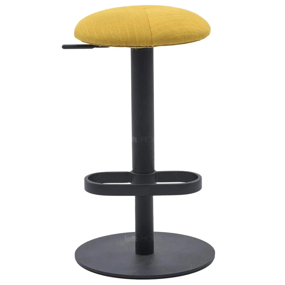 Minimalist fabric round bar stool shell in still life.