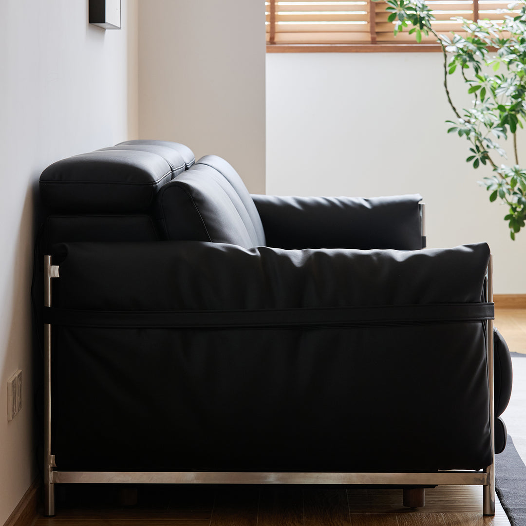 Minimalist genuine leather electric recliner 2 seater sofa calmera in real life style.