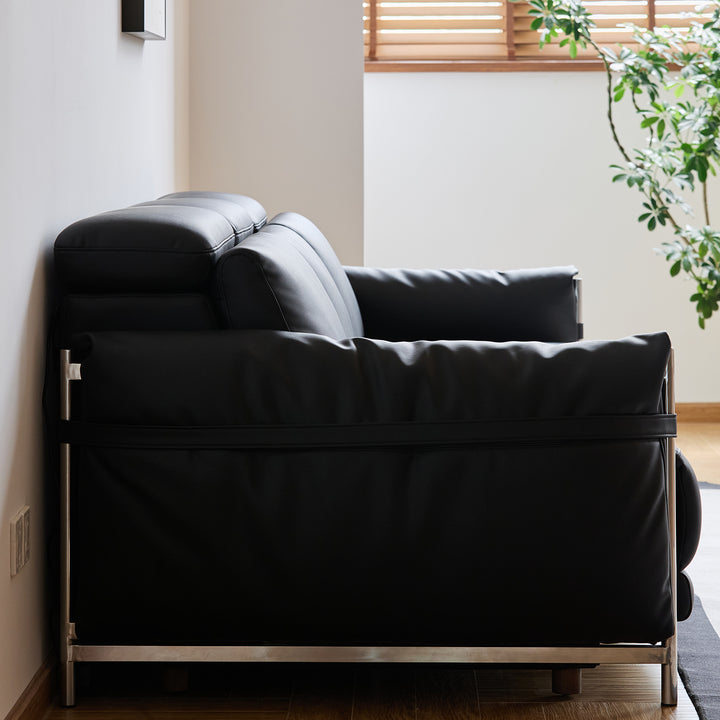 Minimalist genuine leather electric recliner 2 seater sofa calmera in real life style.