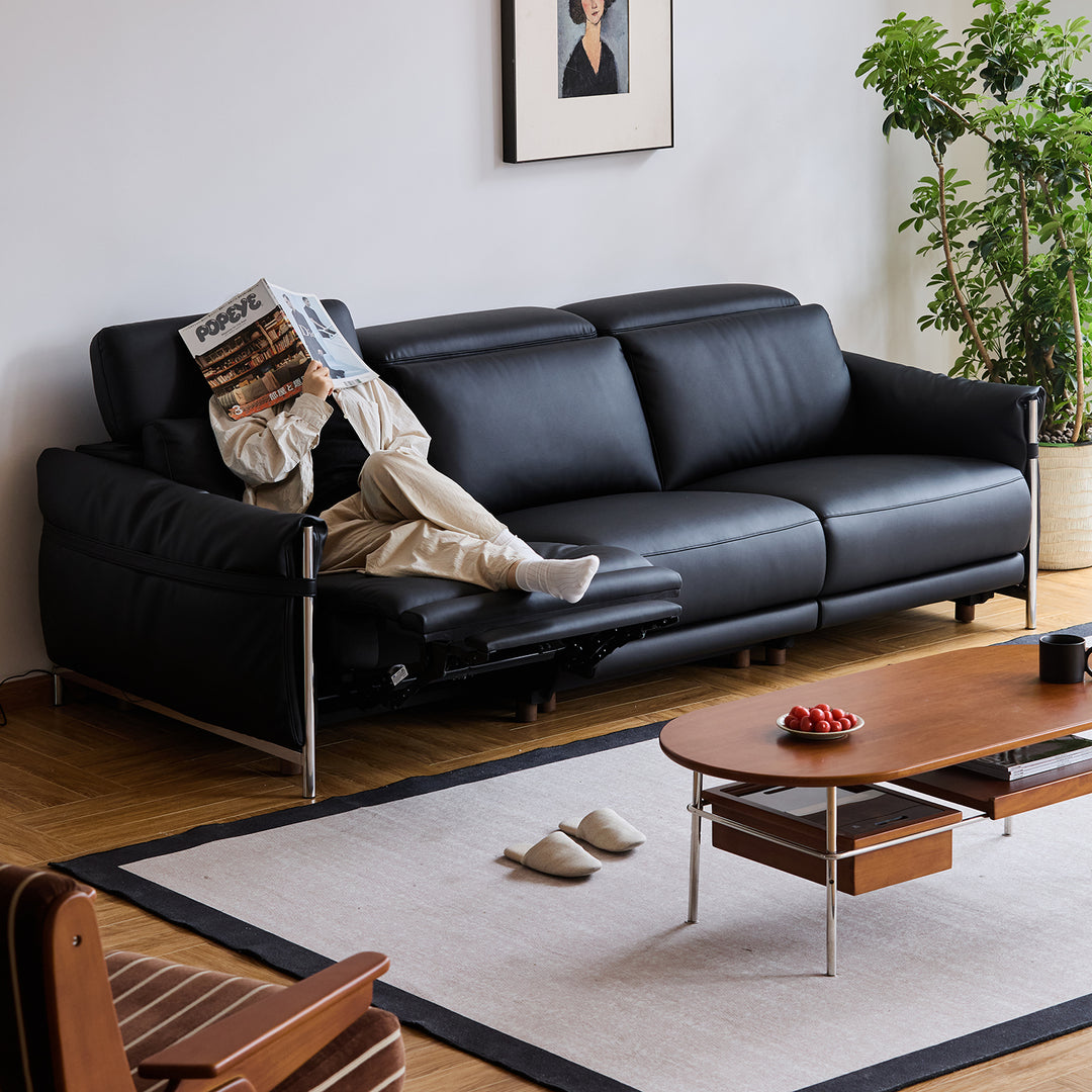 Minimalist genuine leather electric recliner 3 seater sofa calmera in panoramic view.