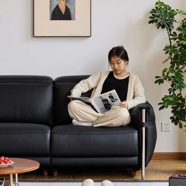Minimalist genuine leather electric recliner 2 seater sofa calmera in close up details.