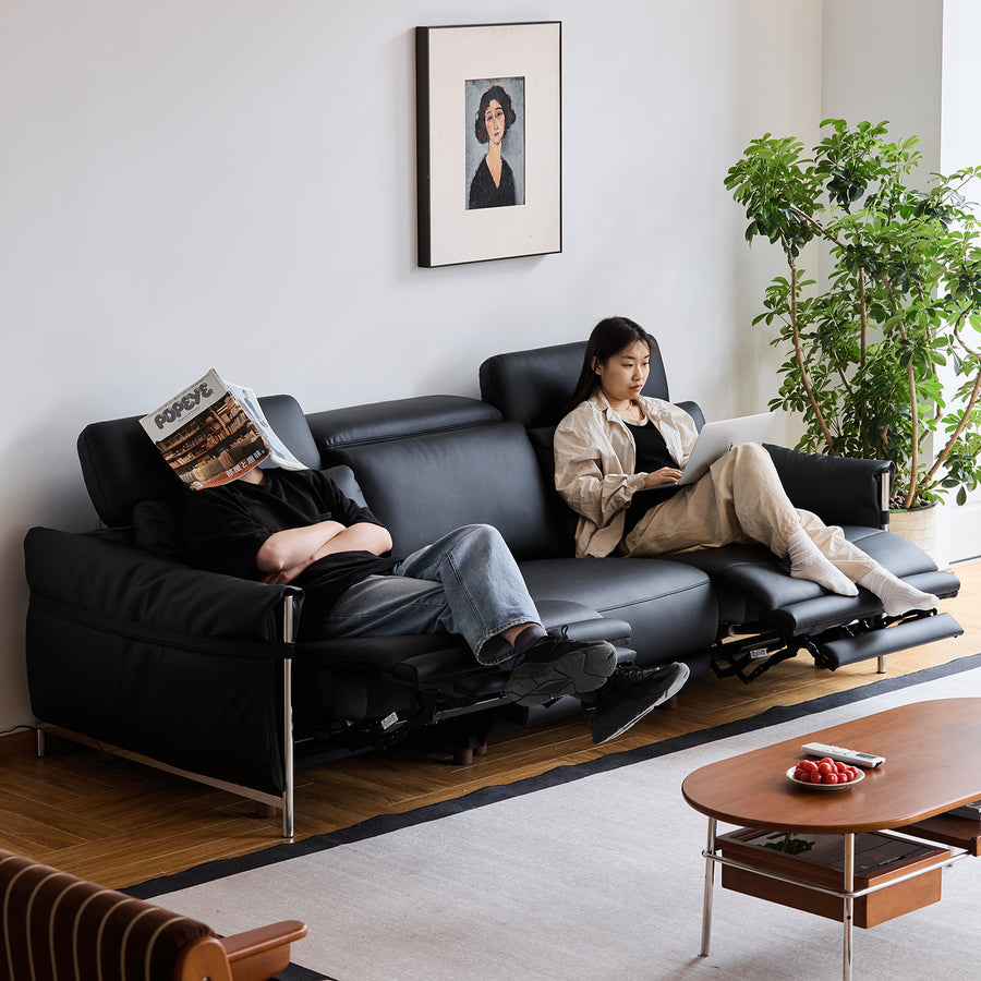 Minimalist genuine leather electric recliner 3 seater sofa calmera in still life.