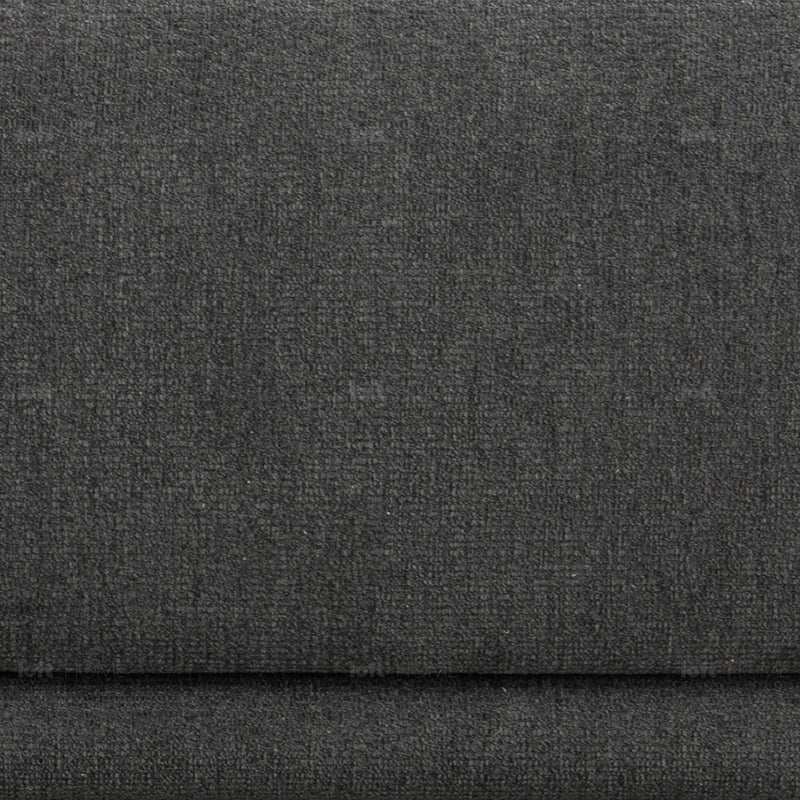 Minimalist mixed weave fabric 2 seater sofa oble in panoramic view.