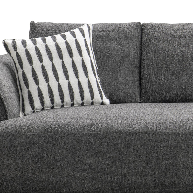 Minimalist mixed weave fabric 2 seater sofa oble in close up details.