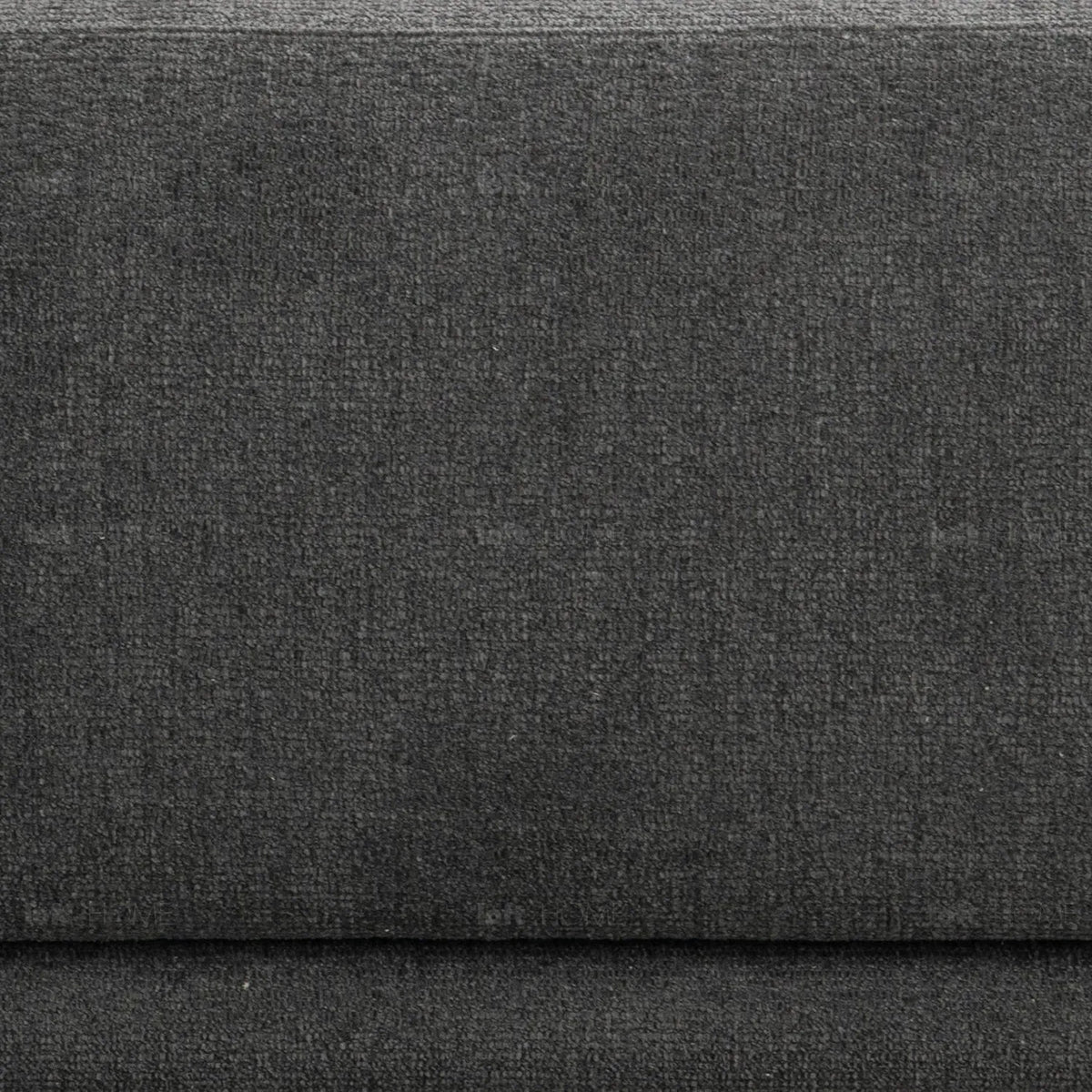 Modern mixed weave fabric 3 seater sofa oble in panoramic view.