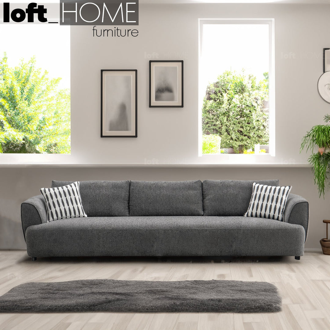 Minimalist mixed weave fabric 3.5 seater sofa oble primary product view.