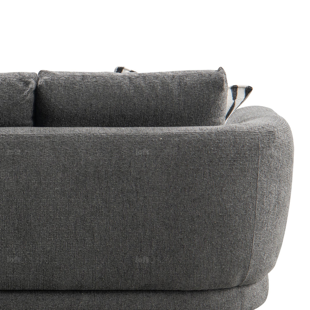 Minimalist mixed weave fabric 3.5 seater sofa oble in close up details.