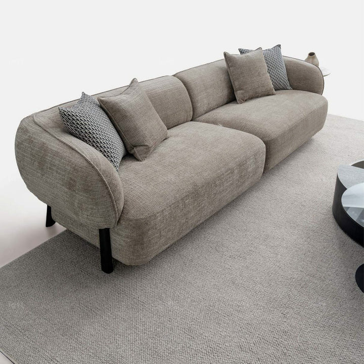 Minimalist mixed weave fabric 4 seater sofa ense material variants.