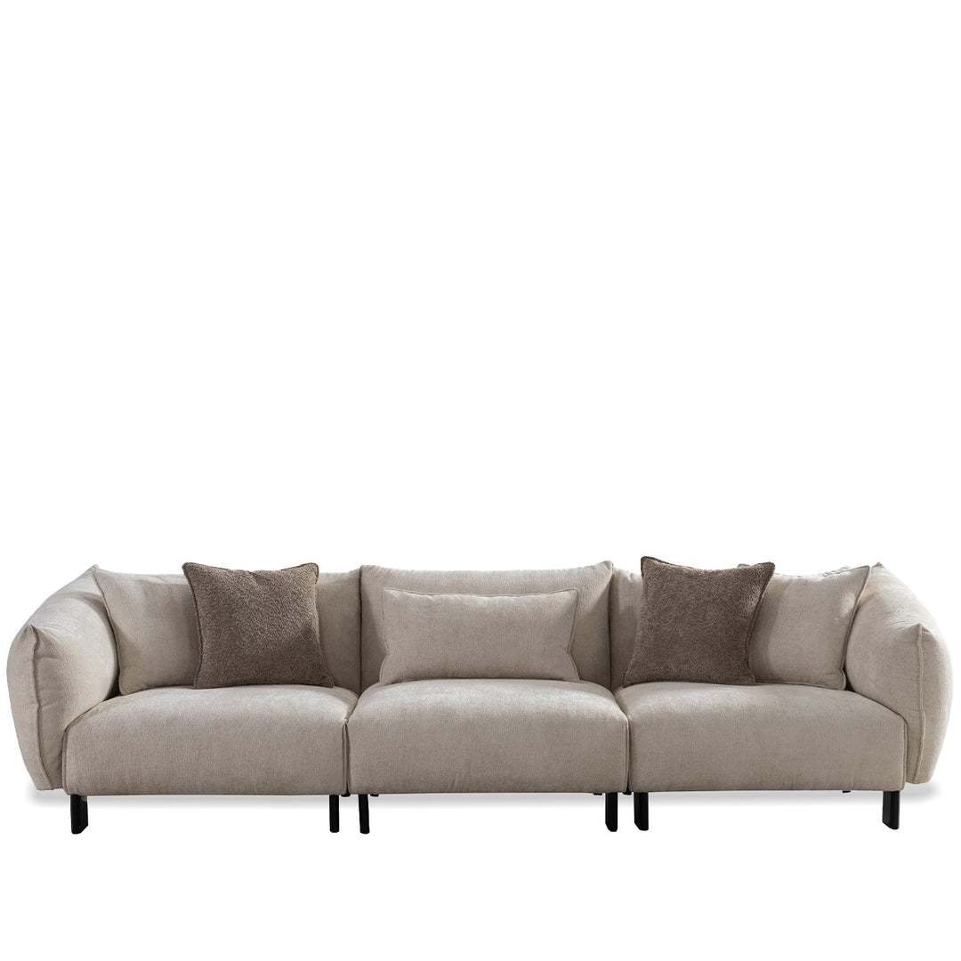 Minimalist mixed weave fabric 4 seater sofa nest in panoramic view.
