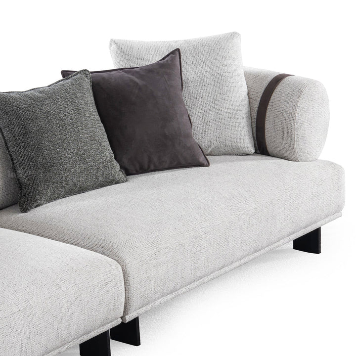 Minimalist mixed weave fabric 4.5 seater sofa divan in panoramic view.