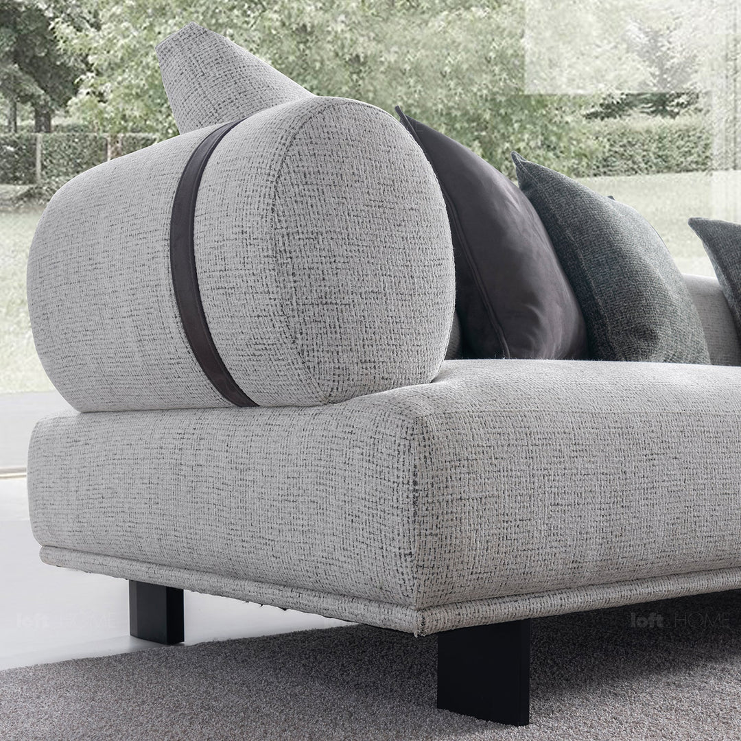 Minimalist mixed weave fabric 4.5 seater sofa divan in still life.