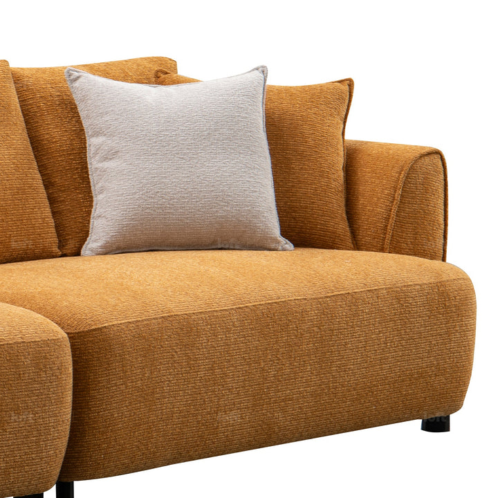 Minimalist mixed weave fabric 4.5 seater sofa elegant with context.