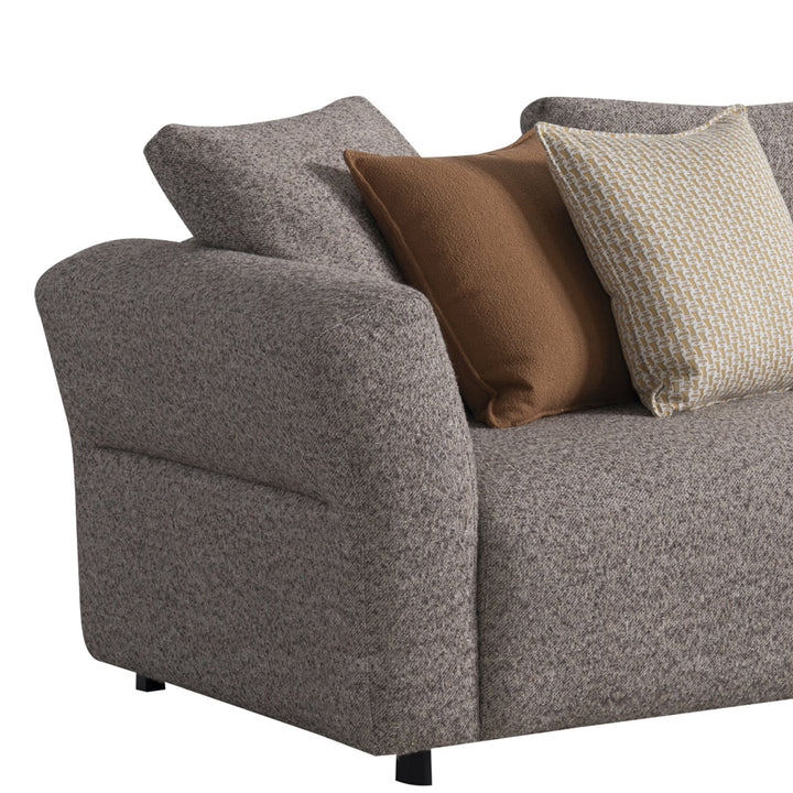 Minimalist mixed weave fabric 4.5 seater sofa glider with context.