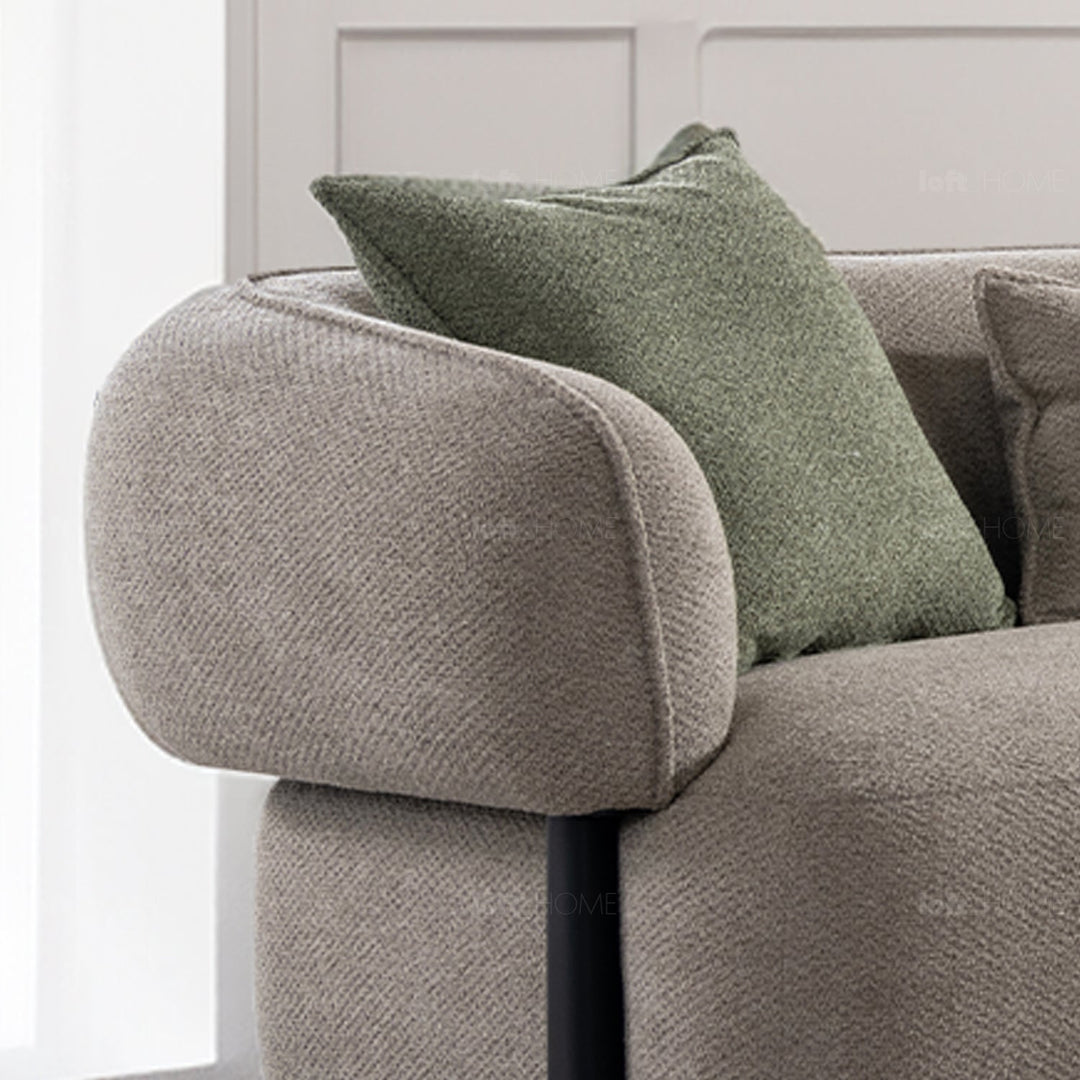 Minimalist mixed weave fabric 4.5 seater sofa vista in still life.