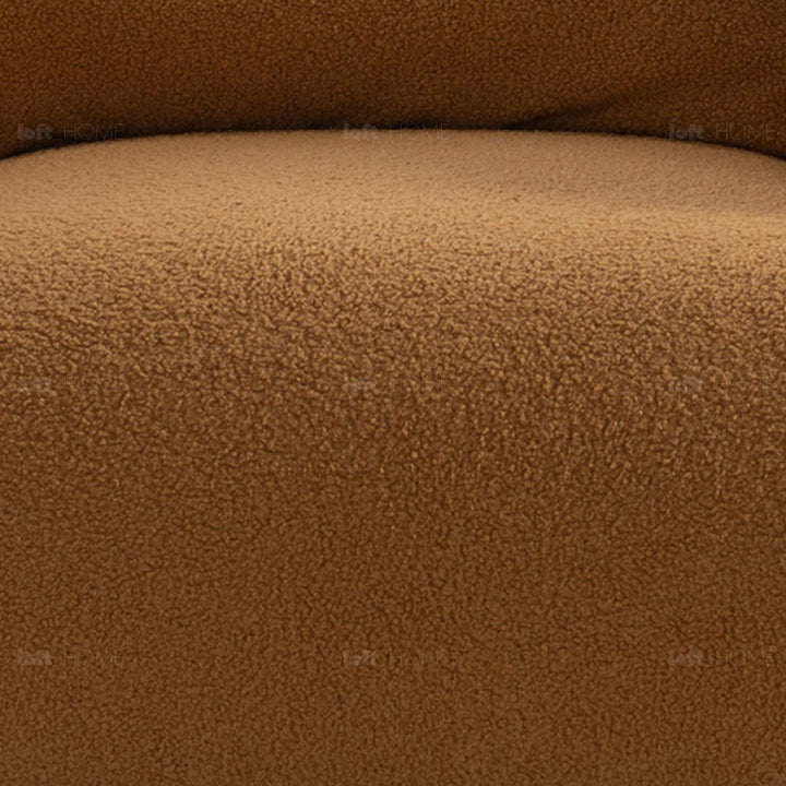 Minimalist sherpa fabric 1 seater sofa saffron in panoramic view.