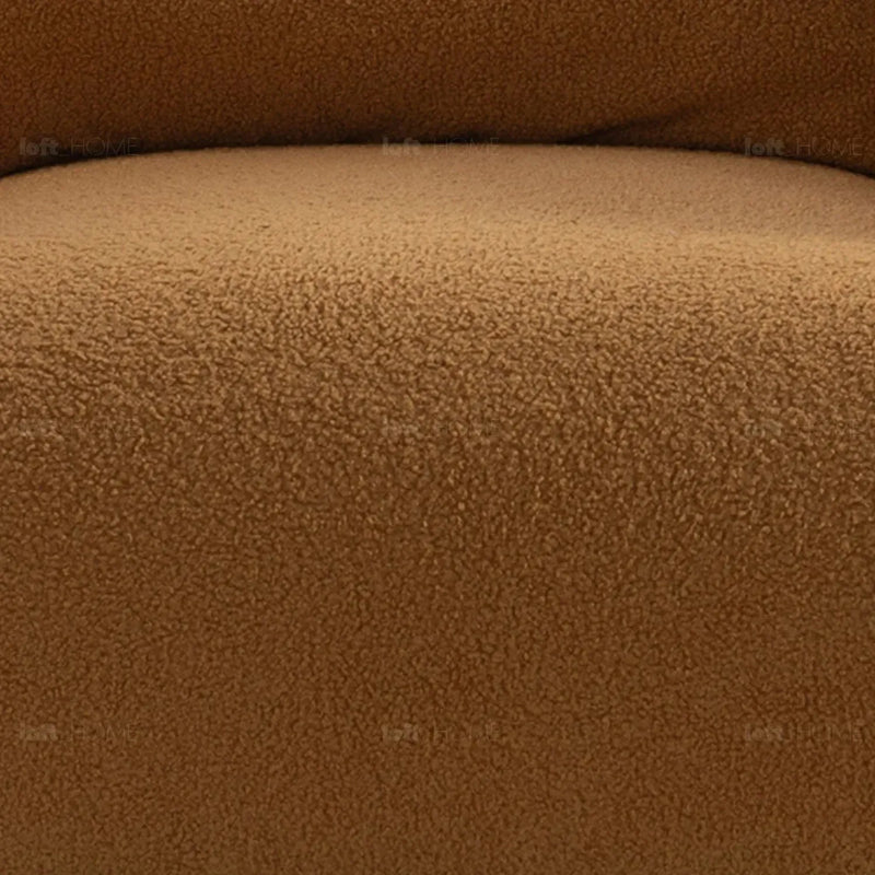 Modern sherpa fabric 1 seater sofa saffron in panoramic view.