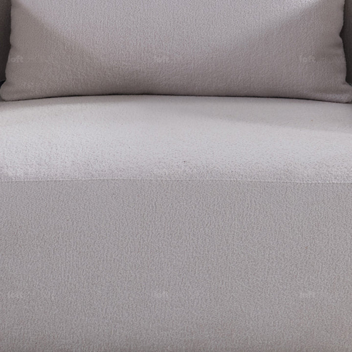 Minimalist sherpa fabric 1 seater sofa simplicity in panoramic view.