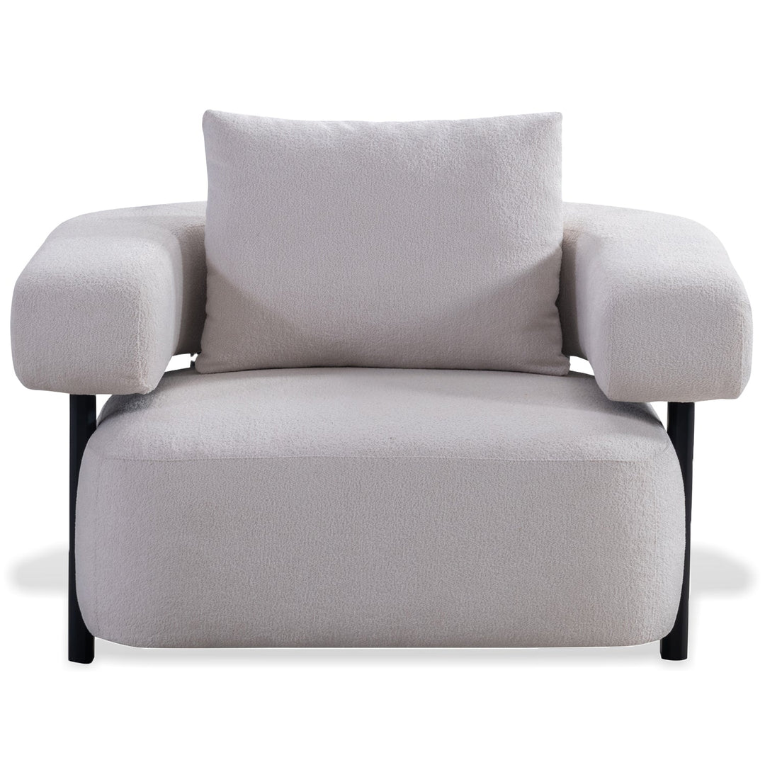 Minimalist sherpa fabric 1 seater sofa simplicity in white background.