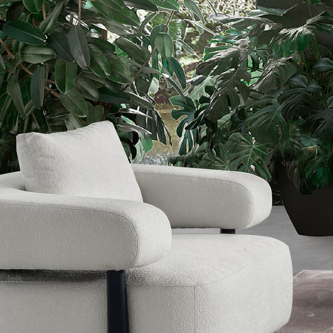 Minimalist sherpa fabric 1 seater sofa simplicity in details.