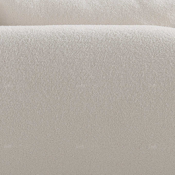 Minimalist sherpa fabric 3.5 seater sofa saffron in panoramic view.