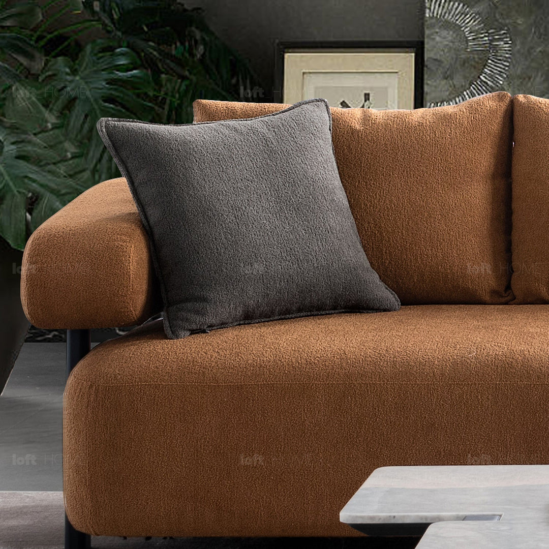 Minimalist sherpa fabric 4.5 seater sofa echo in close up details.