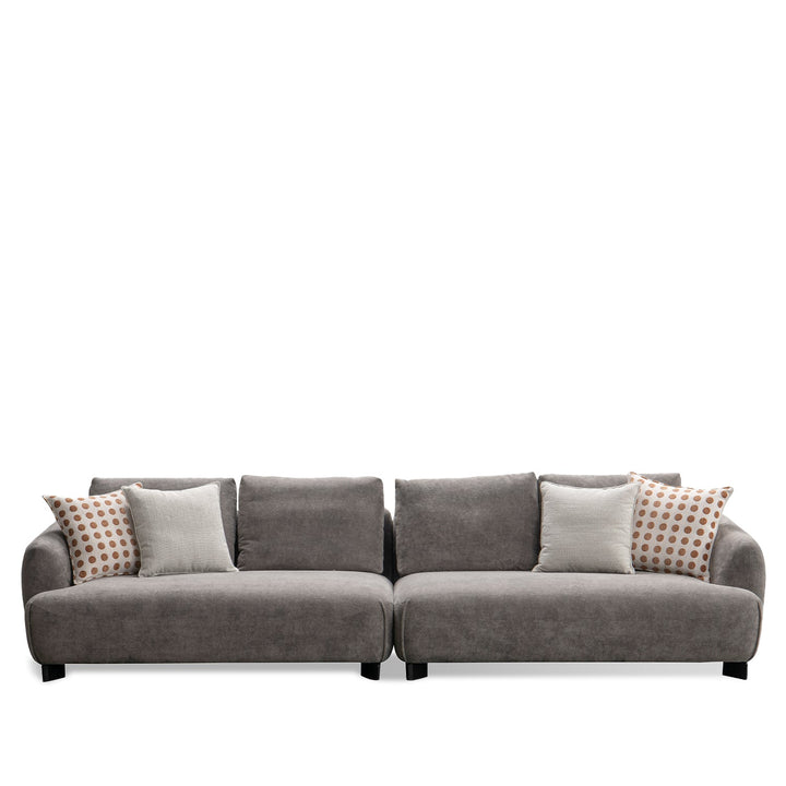 Minimalist sherpa fabric 4.5 seater sofa grand in white background.