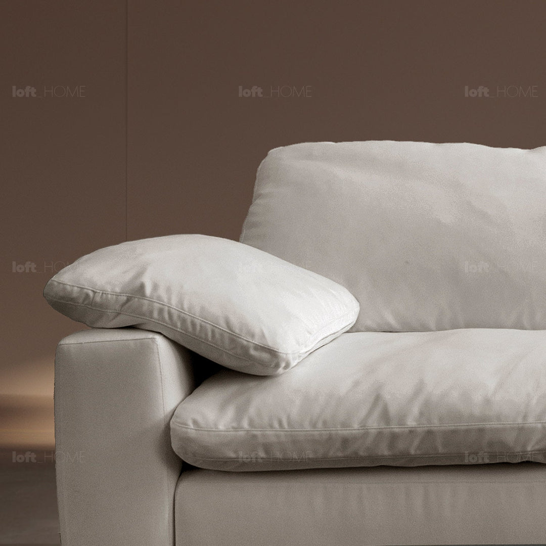 Minimalist suede fabric 4.5 seater sofa cloud in panoramic view.