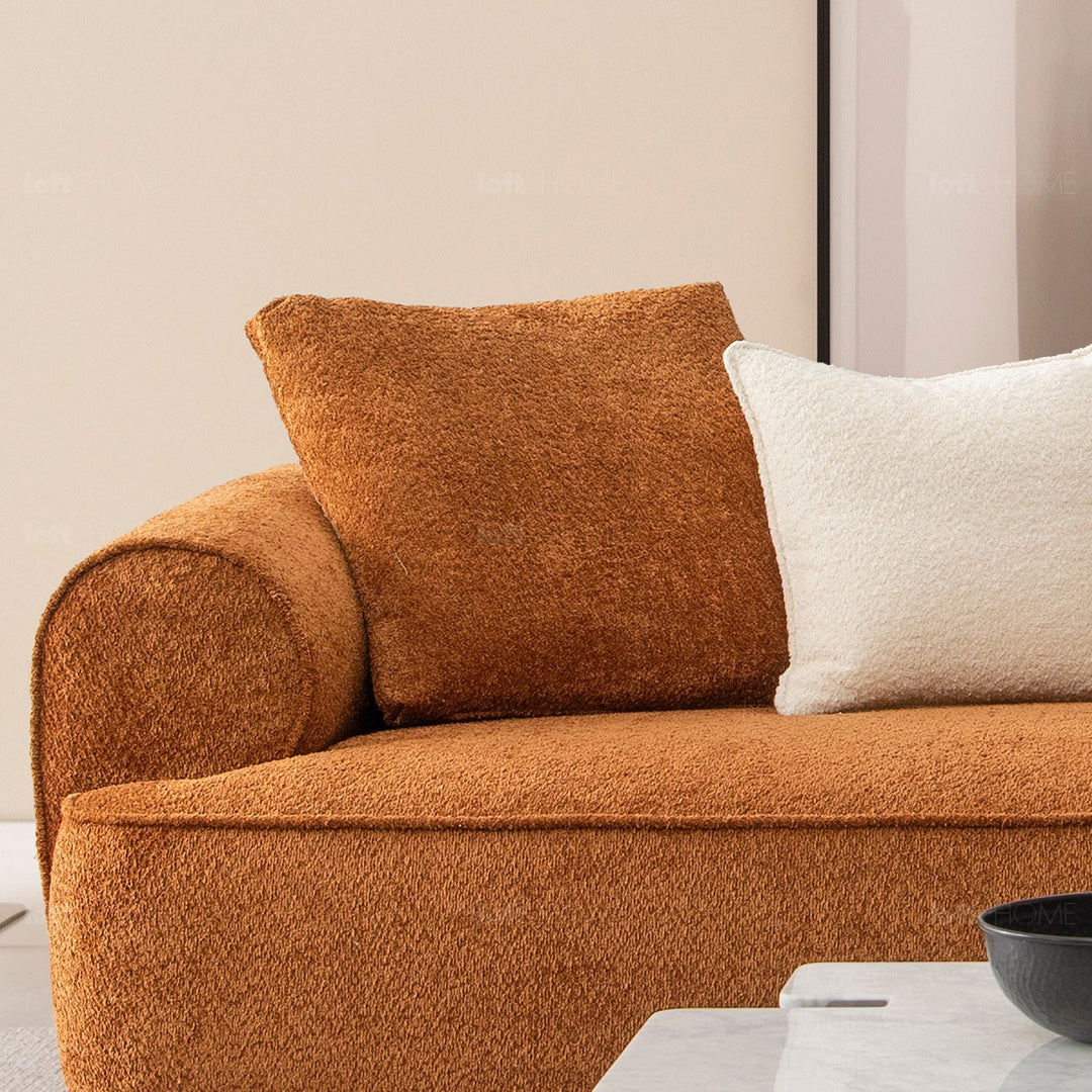 Minimalist teddy fabric 4.5 seater sofa elegant in still life.