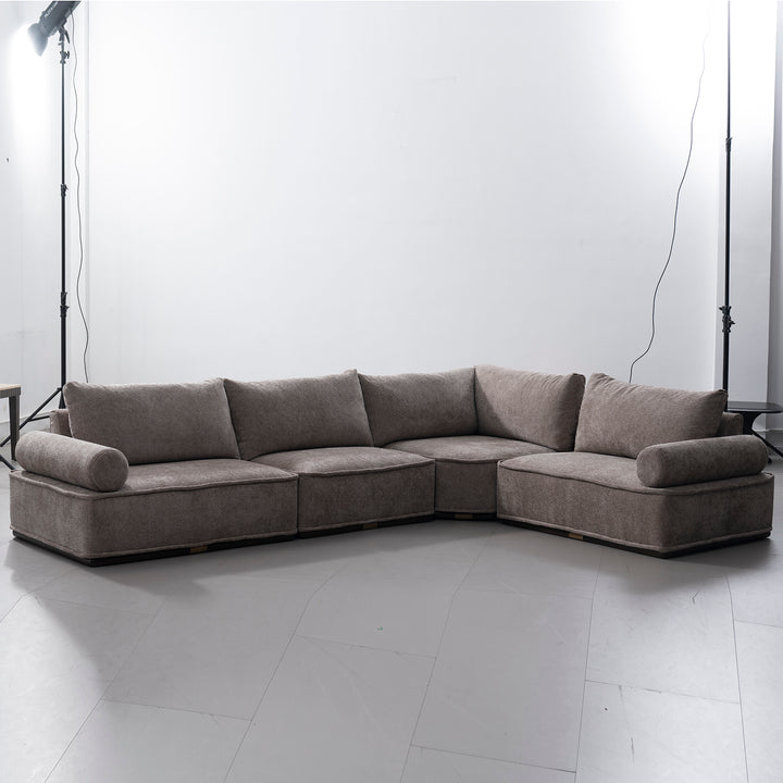 Minimalist corduroy velvet fabric modular l shape sectional sofa 4+l cordy in panoramic view.