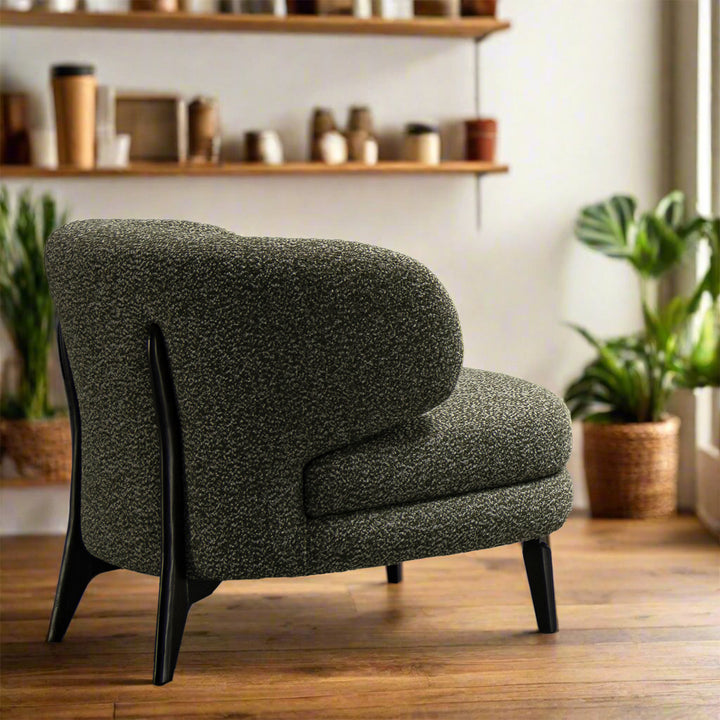 Modern boucle fabric 1 seater sofa moss in panoramic view.