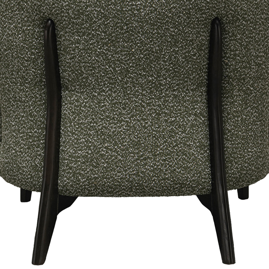 Modern boucle fabric 1 seater sofa moss with context.